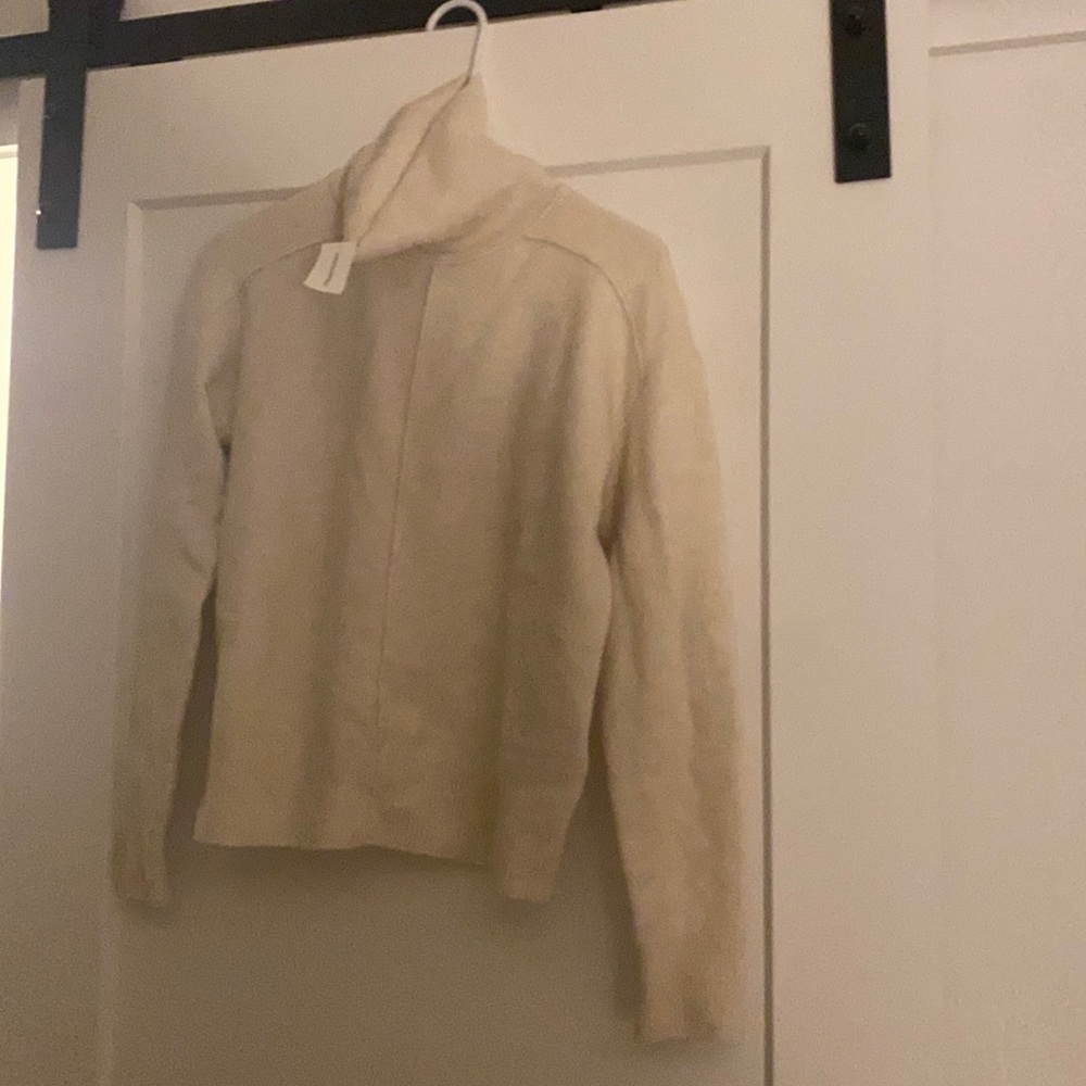 Cream turtleneck sweater